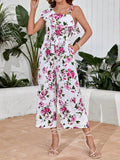 EMERY ROSE 1pc Floral Print Asymmetrical Neck Ruffle Trim Belted Wide Leg Jumpsuit